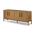 Amber-finished oak forms a clean silhouette with plenty of storage, accented with long iron hardware wrapped in black top-grain leather. Outset legs add an element of interest. Rear cutouts for cord management Amethyst Home provides interior design, new home construction design consulting, vintage area rugs, and lighting in the Omaha metro area.