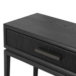 Featuring Rosenell Black Oak Veneer Console Table 60" by Four Hands at Amethyst Home. Elevate your living space or media room with a slim-profile console of black-finished oak. A smooth top pairs with two drawers covered with woven paper cord, while lower open shelving creates bonus storage and display options. The result: a dark, Scandinavian-inspired look th. Amethyst Home provides interior design, new home construction design consulting, vintage area rugs, and lighting in the Boston metro area.