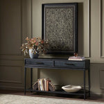 Featuring Rosenell Black Oak Veneer Console Table 60" by Four Hands at Amethyst Home. Elevate your living space or media room with a slim-profile console of black-finished oak. A smooth top pairs with two drawers covered with woven paper cord, while lower open shelving creates bonus storage and display options. The result: a dark, Scandinavian-inspired look th. Amethyst Home provides interior design, new home construction design consulting, vintage area rugs, and lighting in the Dallas metro area.