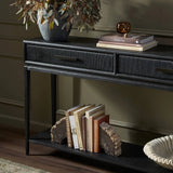 Featuring Rosenell Black Oak Veneer Console Table 60" by Four Hands at Amethyst Home. Elevate your living space or media room with a slim-profile console of black-finished oak. A smooth top pairs with two drawers covered with woven paper cord, while lower open shelving creates bonus storage and display options. The result: a dark, Scandinavian-inspired loo. Amethyst Home provides interior design, new home construction design consulting, vintage area rugs, and lighting in the Des Moines metro area.