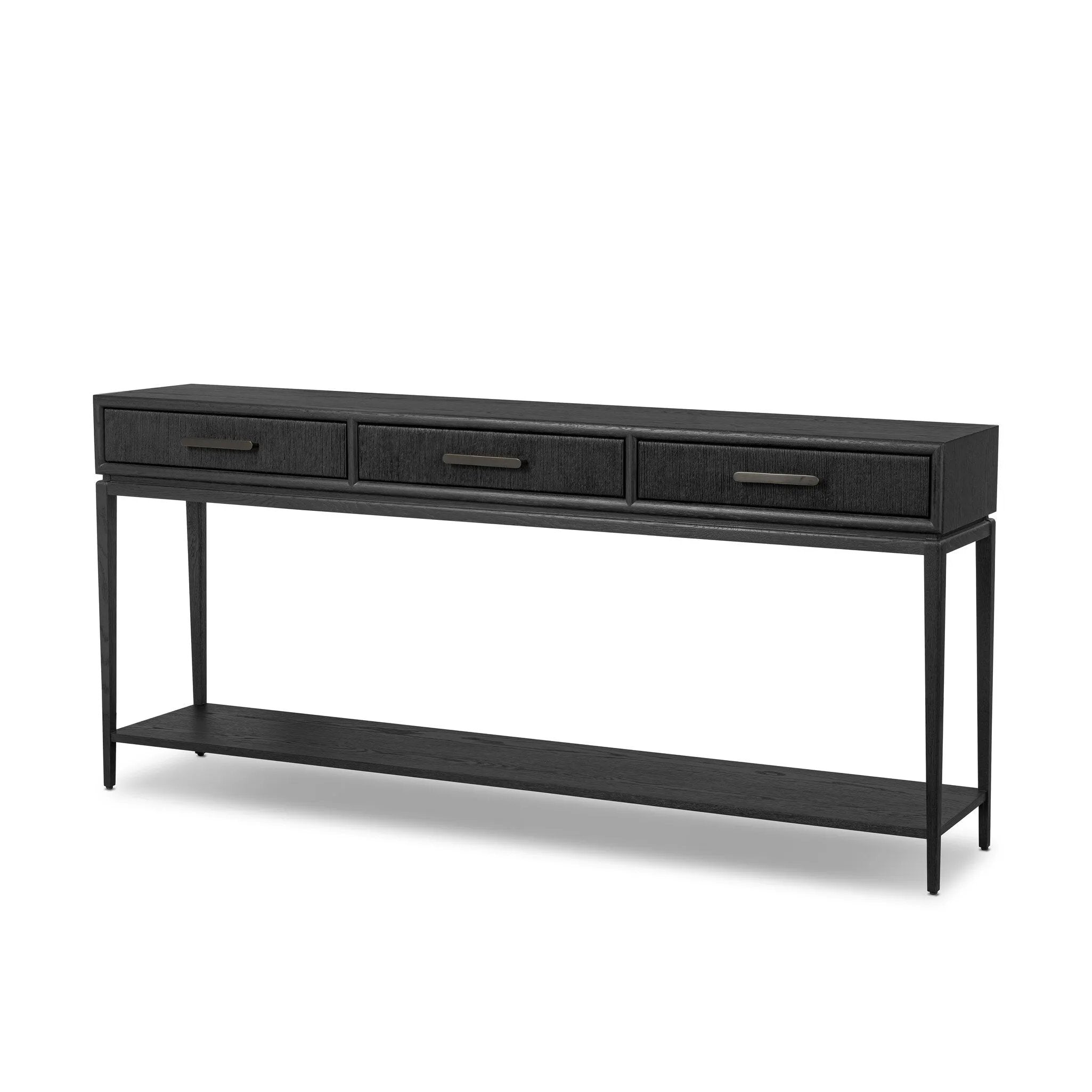 Featuring Rosenell Black Oak Veneer Console Table 78" by Four Hands at Amethyst Home. Elevate your living space or media room with a slim-profile console of black-finished oak. A smooth top pairs with three drawers covered with woven paper cord, while lower open shelving creates bonus storage and display options. The result: a dark, Scandinavian-inspired look t. Amethyst Home provides interior design, new home construction design consulting, vintage area rugs, and lighting in the Omaha metro area.