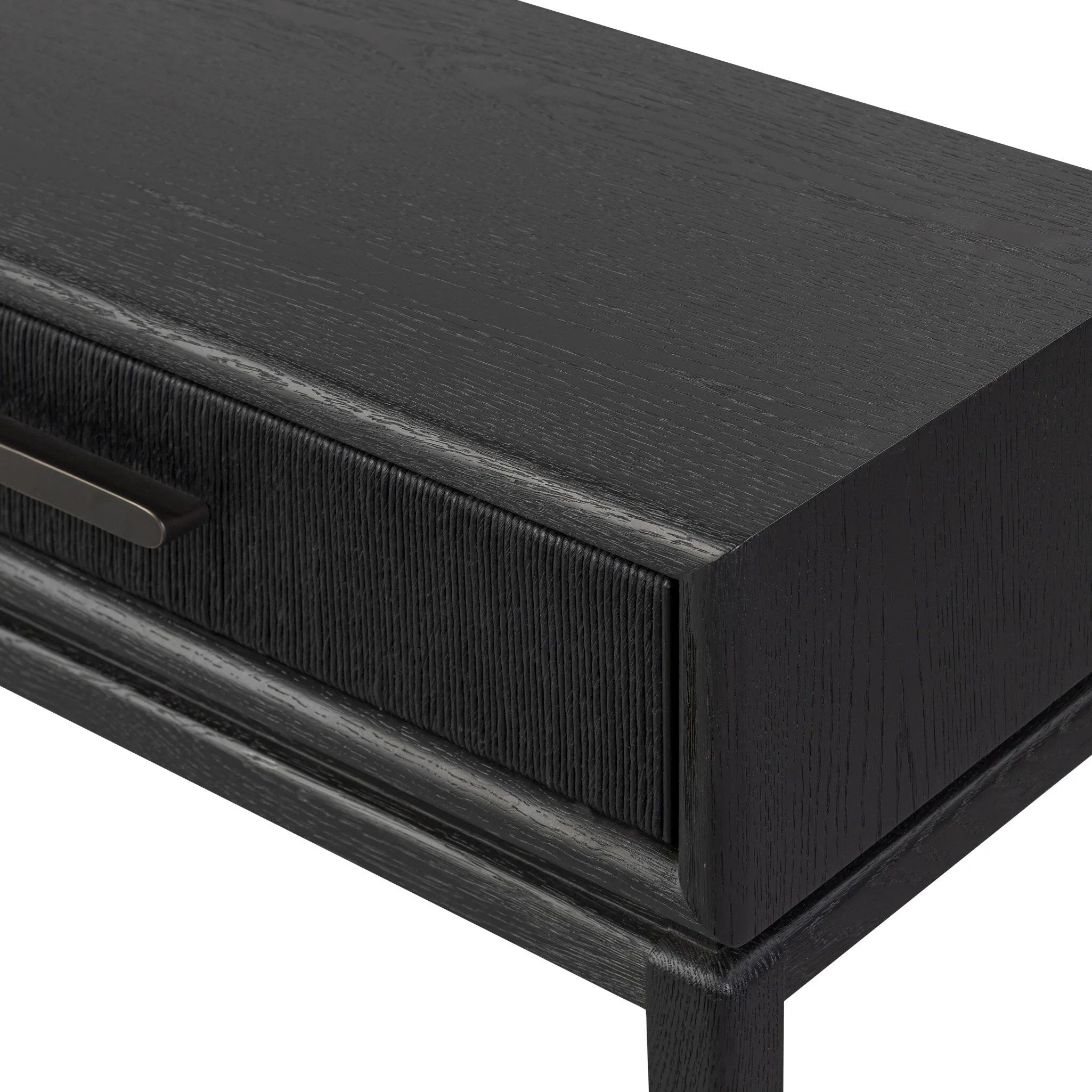 Featuring Rosenell Black Oak Veneer Console Table 78" by Four Hands at Amethyst Home. Elevate your living space or media room with a slim-profile console of black-finished oak. A smooth top pairs with three drawers covered with woven paper cord, while lower open shelving creates bonus storage and display options. The result: a dark, Scandinavian-inspired loo. Amethyst Home provides interior design, new home construction design consulting, vintage area rugs, and lighting in the Portland metro area.