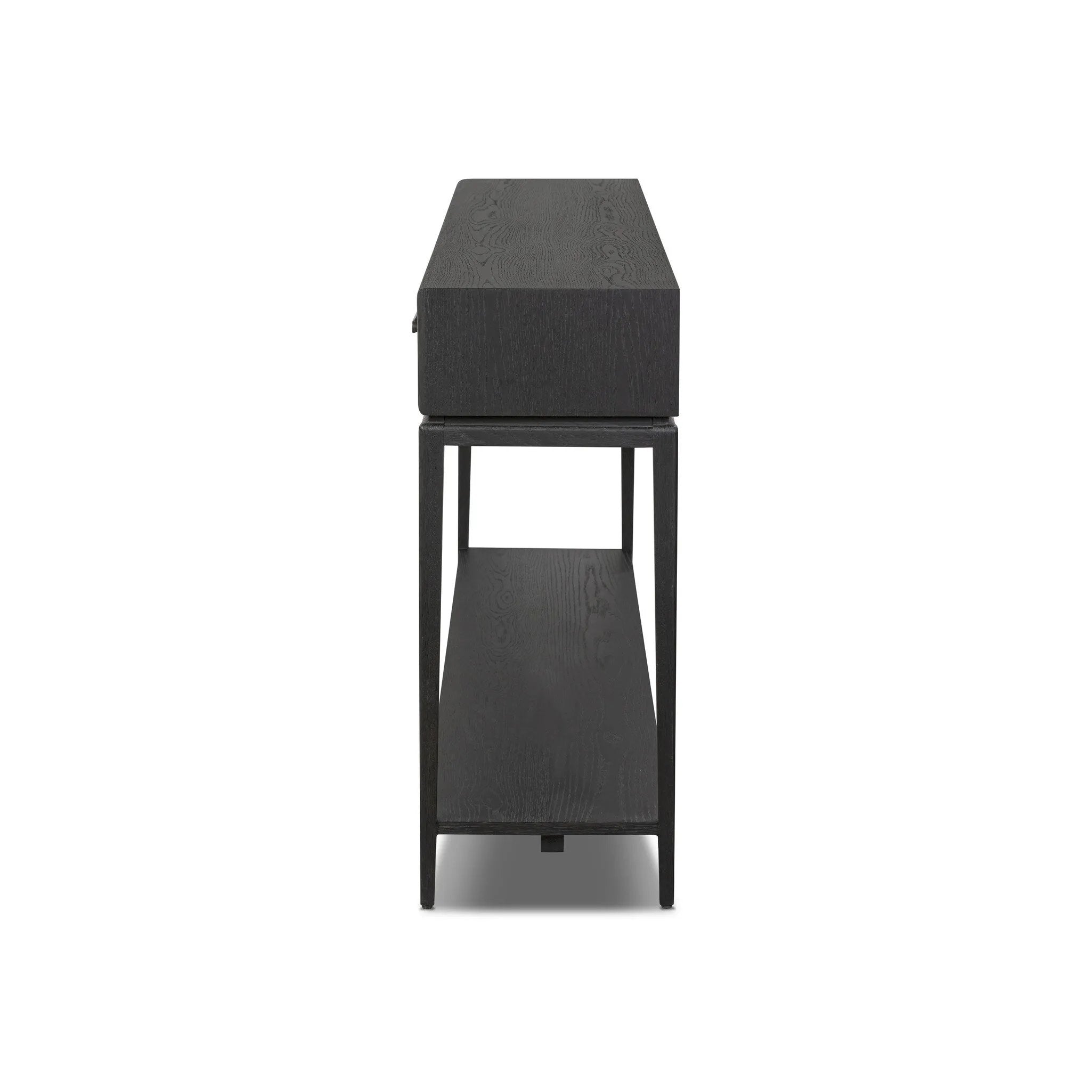 Featuring Rosenell Black Oak Veneer Console Table 78" by Four Hands at Amethyst Home. Elevate your living space or media room with a slim-profile console of black-finished oak. A smooth top pairs with three drawers covered with woven paper cord, while lower open shelving creates bonus storage and display options. The result: a dark, Scandinavian-inspired l. Amethyst Home provides interior design, new home construction design consulting, vintage area rugs, and lighting in the Scottsdale metro area.