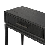 Featuring Rosenell Black Oak Veneer Console Table 78" by Four Hands at Amethyst Home. Elevate your living space or media room with a slim-profile console of black-finished oak. A smooth top pairs with three drawers covered with woven paper cord, while lower open shelving creates bonus storage and display options. The result: a dark, Scandinavian-inspired l. Amethyst Home provides interior design, new home construction design consulting, vintage area rugs, and lighting in the Washington metro area.