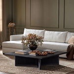 Featuring Rosenell Black Oak Veneer Square Coffee Table by Four Hands at Amethyst Home. Anchor your living space with a squared coffee table of black-finished oak. A smooth top pairs with a panel-style base of woven paper cord for a rich, clean look that will work into your collection beautifully. Overall Dimensions: 55.00"w x 55.00"d x 15.00"h. Amethyst Home provides interior design, new home construction design consulting, vintage area rugs, and lighting in the Newport Beach metro area.