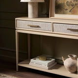 Featuring Rosenell Natural Oak Veneer Console Table 78" by Four Hands at Amethyst Home. Elevate your living space or media room with a slim-profile console of light, natural oak. A smooth top pairs with three drawers covered with woven paper cord, while lower open shelving creates bonus storage and display options. The result: a clean, Scandinavian-inspired loo. Amethyst Home provides interior design, new home construction design consulting, vintage area rugs, and lighting in the Miami metro area.