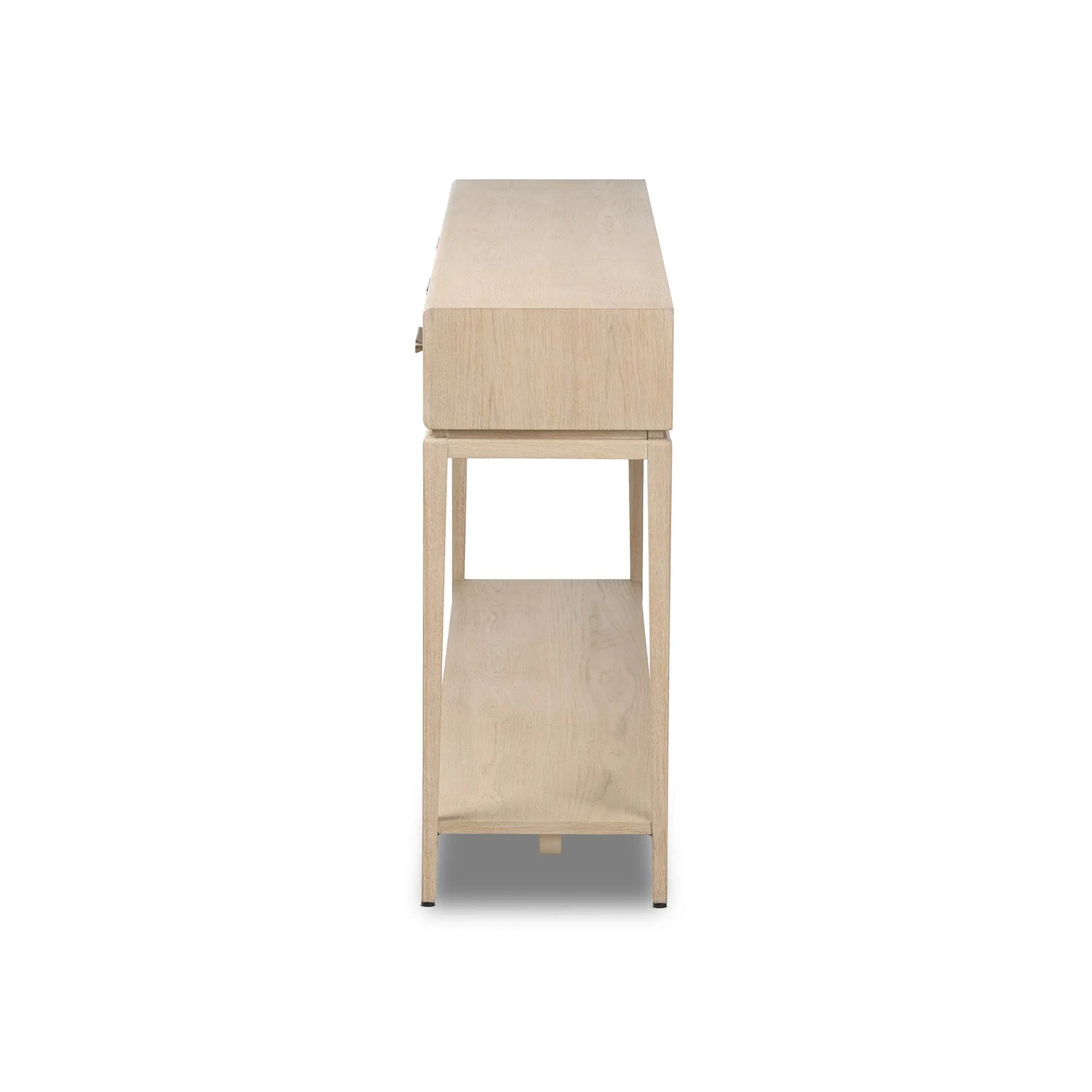 Featuring Rosenell Natural Oak Veneer Console Table 78" by Four Hands at Amethyst Home. Elevate your living space or media room with a slim-profile console of light, natural oak. A smooth top pairs with three drawers covered with woven paper cord, while lower open shelving creates bonus storage and display options. The result: a clean, Scandinavian-insp. Amethyst Home provides interior design, new home construction design consulting, vintage area rugs, and lighting in the Newport Beach metro area.