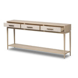 Featuring Rosenell Natural Oak Veneer Console Table 78" by Four Hands at Amethyst Home. Elevate your living space or media room with a slim-profile console of light, natural oak. A smooth top pairs with three drawers covered with woven paper cord, while lower open shelving creates bonus storage and display options. The result: a clean, Scandinavian-inspired l. Amethyst Home provides interior design, new home construction design consulting, vintage area rugs, and lighting in the Seattle metro area.
