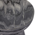 Precise curves add up to modern presence. Bold ebony marble is carved from a single piece of stone and turned on a lathe to form the curves and angles of this end table Amethyst Home provides interior design, new home construction design consulting, vintage area rugs, and lighting in the Des Moines metro area.