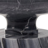 Precise curves add up to modern presence. Bold ebony marble is carved from a single piece of stone and turned on a lathe to form the curves and angles of this end table Amethyst Home provides interior design, new home construction design consulting, vintage area rugs, and lighting in the Laguna Beach metro area.