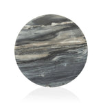 Precise curves add up to modern presence. Bold ebony marble is carved from a single piece of stone and turned on a lathe to form the curves and angles of this end table Amethyst Home provides interior design, new home construction design consulting, vintage area rugs, and lighting in the Scottsdale metro area.