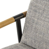 Textural grey seating upholstered in high-performance fabric exclusive to Four Hands, with angular solid oak arms and black-finished stainless steel framing.As lovers of organic modern style at Amethyst, we love the designer inspired Rowen Dining Chair - Thames Raven. Amethyst Home provides interior design, new home construction design consulting, vintage area rugs, and lighting in the Dallas metro area.