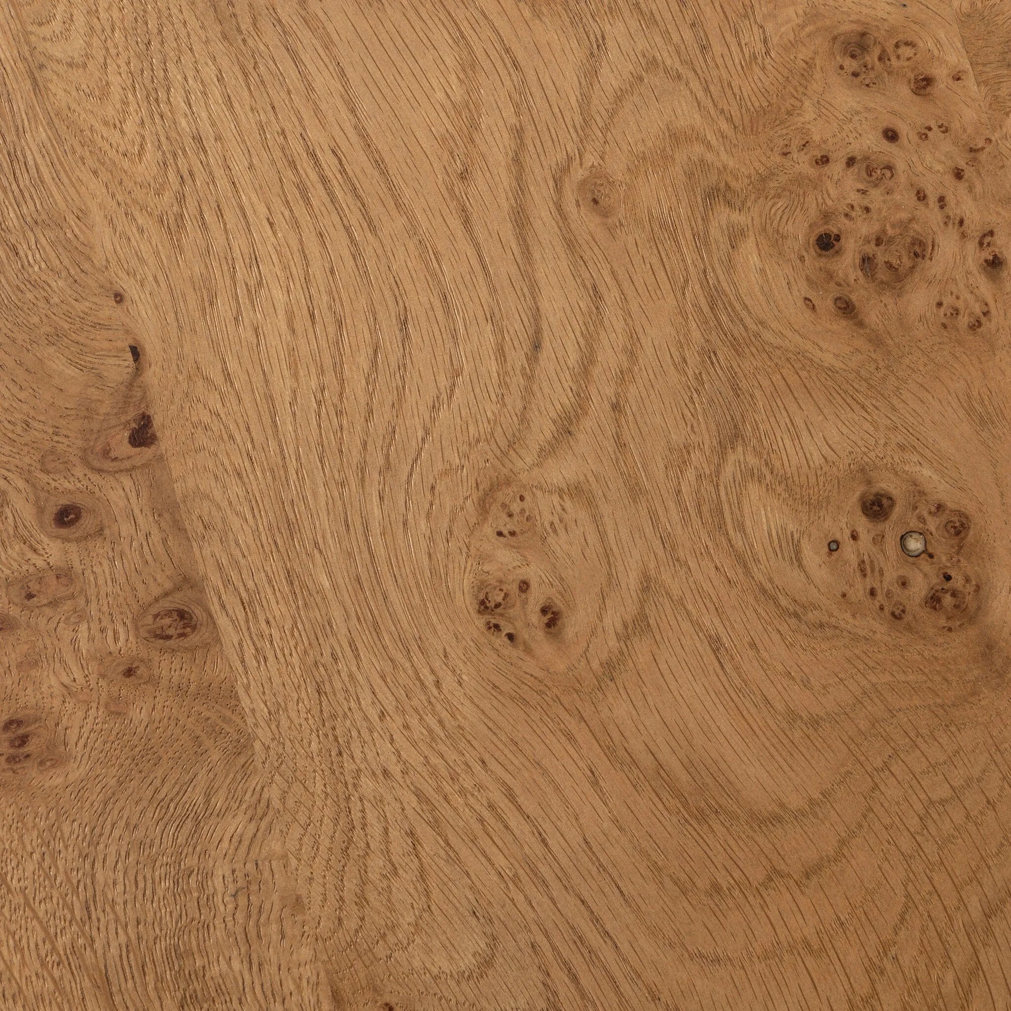 A coffee table that moves with you. Made from oak burl veneer with beautiful movement, this three-piece design pulls apart to create different looks and configurations based on your needs. Pushed together, individual pieces shape a circle; create a wave shape touching just the end pieces together — or, style all three apart. Amethyst Home provides interior design, new home construction design consulting, vintage area rugs, and lighting in the Los Angeles metro area.