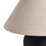 Featuring Russo Aged Black Terracotta Table Lamp by Four Hands at Amethyst Home. In this black terra cotta vase table lamp, each piece bears unique touches from its natural finishing process. Topped with a shade of natural linen, for a textural contrast.
Overall Dimensions: 20.0" L x 20.0 " W x 22.0" H
Materials: Terracotta, 100% Flax/Linen, IronWeight: 1. Amethyst Home provides interior design, new home construction design consulting, vintage area rugs, and lighting in the Kansas City metro area.