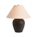 Featuring Russo Aged Black Terracotta Table Lamp by Four Hands at Amethyst Home. In this black terra cotta vase table lamp, each piece bears unique touches from its natural finishing process. Topped with a shade of natural linen, for a textural contrast.
Overall Dimensions: 20.0" L x 20.0 " W x 22.0" H
Materials: Terracotta, 100% Flax/Linen, IronWeight: 10.. Amethyst Home provides interior design, new home construction design consulting, vintage area rugs, and lighting in the Nashville metro area.