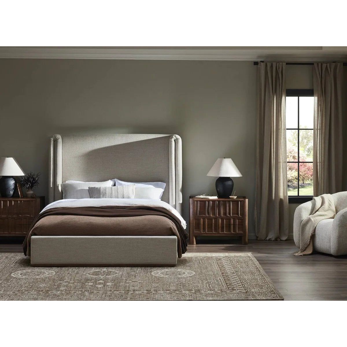 Featuring Russo Aged Black Terracotta Table Lamp by Four Hands at Amethyst Home. In this black terra cotta vase table lamp, each piece bears unique touches from its natural finishing process. Topped with a shade of natural linen, for a textural contrast.
Overall Dimensions: 20.0" L x 20.0 " W x 22.0" H
Materials: Terracotta, 100% Flax/Linen, IronWeight. Amethyst Home provides interior design, new home construction design consulting, vintage area rugs, and lighting in the Salt Lake City metro area.