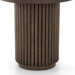 Inspired by décor in the majestic palaces of Jaipur, a conversation-starting end table is made from mixed reclaimed woods, with a rounded top and base with vertical reeding Amethyst Home provides interior design, new home construction design consulting, vintage area rugs, and lighting in the Des Moines metro area.