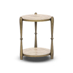 Featuring Ruthie Fossil Marble End Table by Four Hands at Amethyst Home. Work a heritage-inspired piece into your collection with a tiered end table of hammered iron in an aged brass. With inset marble shelves and turn-style legs, this table's fine details bring an elevated, artisan look to any space. Perfectly sized to keep your favorite book or drink on h. Amethyst Home provides interior design, new home construction design consulting, vintage area rugs, and lighting in the Calabasas metro area.