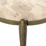 Featuring Ruthie Fossil Marble End Table by Four Hands at Amethyst Home. Work a heritage-inspired piece into your collection with a tiered end table of hammered iron in an aged brass. With inset marble shelves and turn-style legs, this table's fine details bring an elevated, artisan look to any space. Perfectly sized to keep your favorite book or drink on h. Amethyst Home provides interior design, new home construction design consulting, vintage area rugs, and lighting in the Nashville metro area.