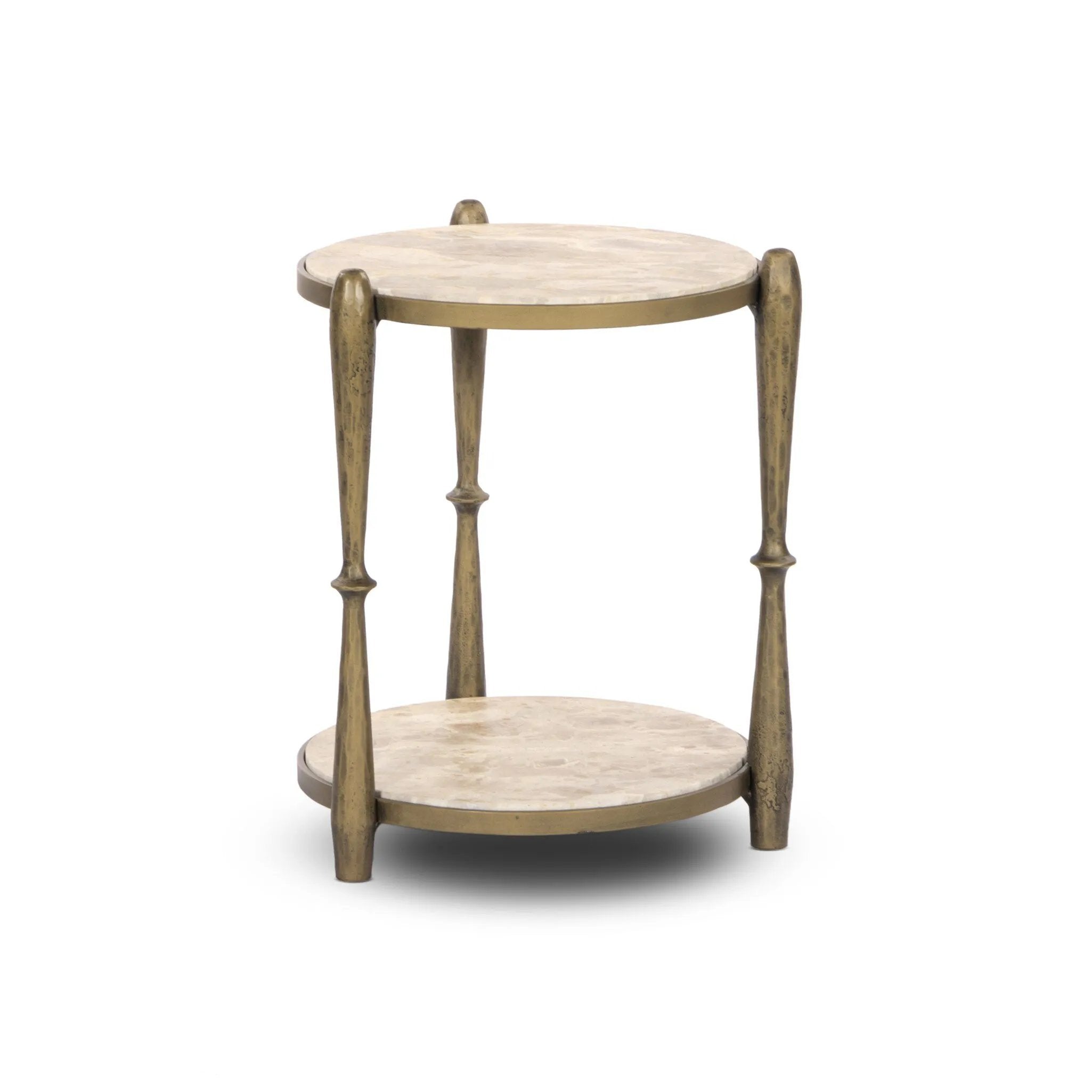 Featuring Ruthie Fossil Marble End Table by Four Hands at Amethyst Home. Work a heritage-inspired piece into your collection with a tiered end table of hammered iron in an aged brass. With inset marble shelves and turn-style legs, this table's fine details bring an elevated, artisan look to any space. Perfectly sized to keep your favorite book or drink on h. Amethyst Home provides interior design, new home construction design consulting, vintage area rugs, and lighting in the Park City metro area.