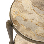 Featuring Ruthie Fossil Marble End Table by Four Hands at Amethyst Home. Work a heritage-inspired piece into your collection with a tiered end table of hammered iron in an aged brass. With inset marble shelves and turn-style legs, this table's fine details bring an elevated, artisan look to any space. Perfectly sized to keep your favorite book or drink on hand.. Amethyst Home provides interior design, new home construction design consulting, vintage area rugs, and lighting in the Tampa metro area.