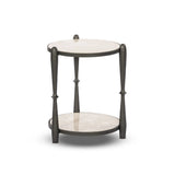 Featuring Ruthie Lunar Marble End Table by Four Hands at Amethyst Home. Work a heritage-inspired piece into your collection with a tiered end table of hammered iron in a hammered gunmetal. With inset marble shelves and turn-style legs, this table's fine details bring an elevated, artisan look to any space. Perfectly sized to keep your favorite book or drink on. Amethyst Home provides interior design, new home construction design consulting, vintage area rugs, and lighting in the Boston metro area.