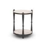 Featuring Ruthie Lunar Marble End Table by Four Hands at Amethyst Home. Work a heritage-inspired piece into your collection with a tiered end table of hammered iron in a hammered gunmetal. With inset marble shelves and turn-style legs, this table's fine details bring an elevated, artisan look to any space. Perfectly sized to keep your favorite book or drink. Amethyst Home provides interior design, new home construction design consulting, vintage area rugs, and lighting in the Charlotte metro area.