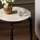 Featuring Ruthie Lunar Marble End Table by Four Hands at Amethyst Home. Work a heritage-inspired piece into your collection with a tiered end table of hammered iron in a hammered gunmetal. With inset marble shelves and turn-style legs, this table's fine details bring an elevated, artisan look to any space. Perfectly sized to keep your favorite book or drink . Amethyst Home provides interior design, new home construction design consulting, vintage area rugs, and lighting in the Monterey metro area.