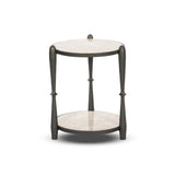 Featuring Ruthie Lunar Marble End Table by Four Hands at Amethyst Home. Work a heritage-inspired piece into your collection with a tiered end table of hammered iron in a hammered gunmetal. With inset marble shelves and turn-style legs, this table's fine details bring an elevated, artisan look to any space. Perfectly sized to keep your favorite book or drink. Amethyst Home provides interior design, new home construction design consulting, vintage area rugs, and lighting in the Park City metro area.