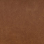 The classic material mix look you want in your dining space. Butterscotch top-grain leather with a subtle vintage look pairs with a neutral performance fabric-upholstered seat. Tapered legs and an armless silhouette look timelessly chic. Amethyst Home provides interior design, new home construction design consulting, vintage area rugs, and lighting in the Dallas metro area.