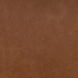 The classic material mix look you want in your dining space. Butterscotch top-grain leather with a subtle vintage look pairs with a neutral performance fabric-upholstered seat. Tapered legs and an armless silhouette look timelessly chic. Amethyst Home provides interior design, new home construction design consulting, vintage area rugs, and lighting in the Dallas metro area.