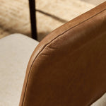 The classic material mix look you want in your dining space. Butterscotch top-grain leather with a subtle vintage look pairs with a neutral performance fabric-upholstered seat. Tapered legs and an armless silhouette look timelessly chic. Amethyst Home provides interior design, new home construction design consulting, vintage area rugs, and lighting in the Los Angeles metro area.