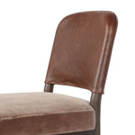 A moody, mixed material look that stands out. A velvety, wool-blend seat and top-grain leather, seat back are framed by solid