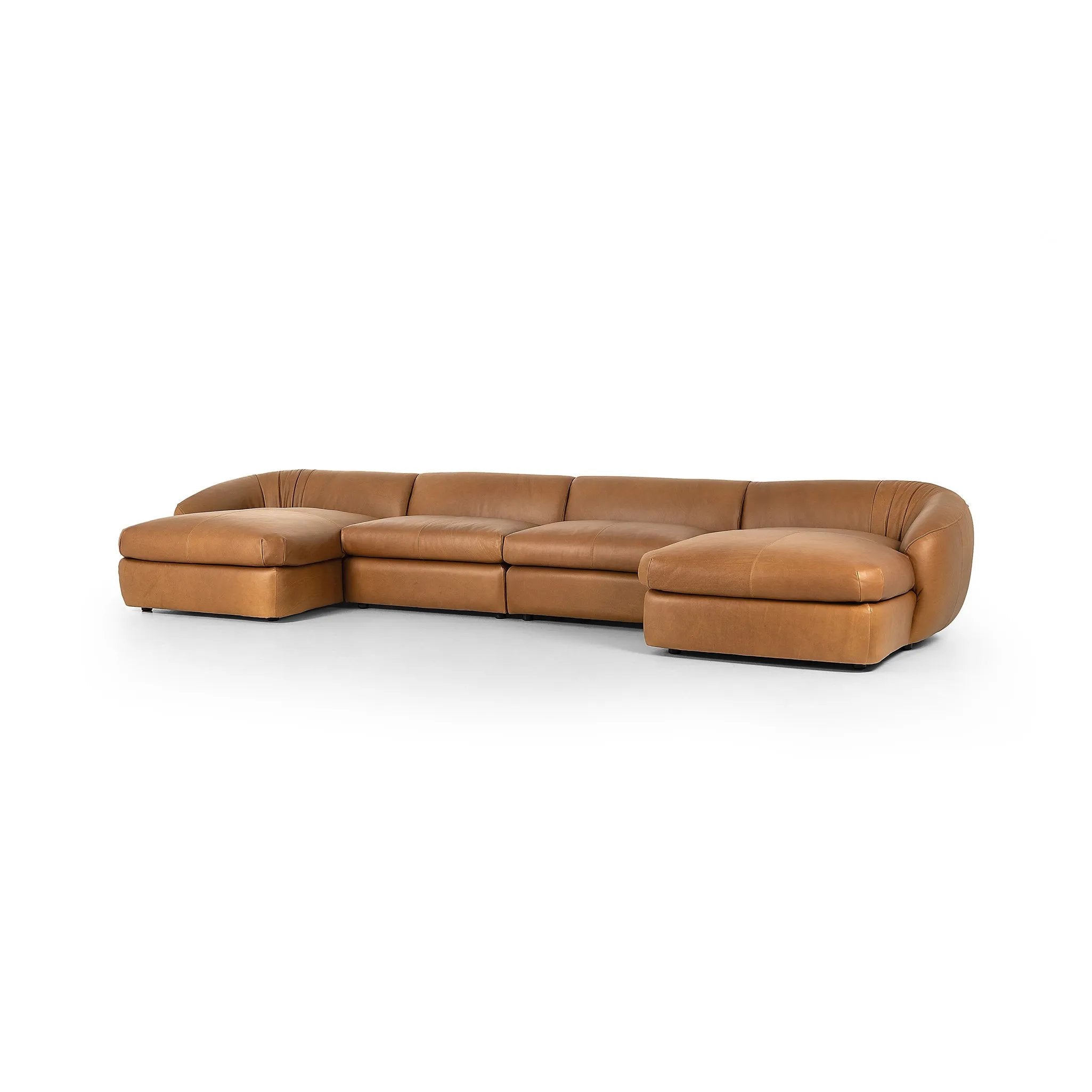 Soft, supple top-grain leather with a warm cognac hue meets vintage vibes with modern comfort. Intricate rouching along the back and corners gives each piece of this four-piece sectional a handcrafted, tailored feel, while feather-wrapped cushioning and spring suspension invite comfortable lounging Amethyst Home provides interior design, new home construction design consulting, vintage area rugs, and lighting in the Seattle metro area.