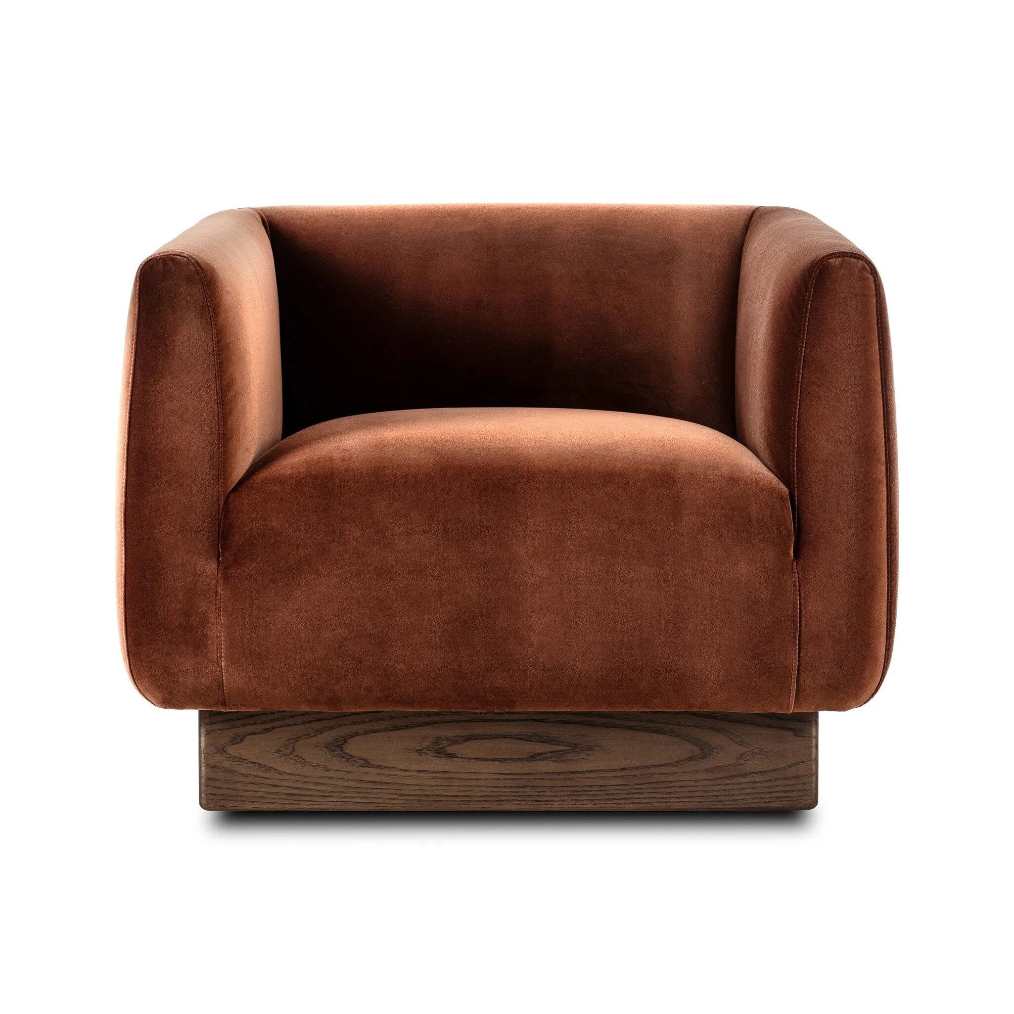 Velvety upholstery in a deep auburn hue covers clean-angled, deeply cushioned seating with a 360-degree swivel base for relaxed lounging and conversation Amethyst Home provides interior design, new home construction design consulting, vintage area rugs, and lighting in the Boston metro area.