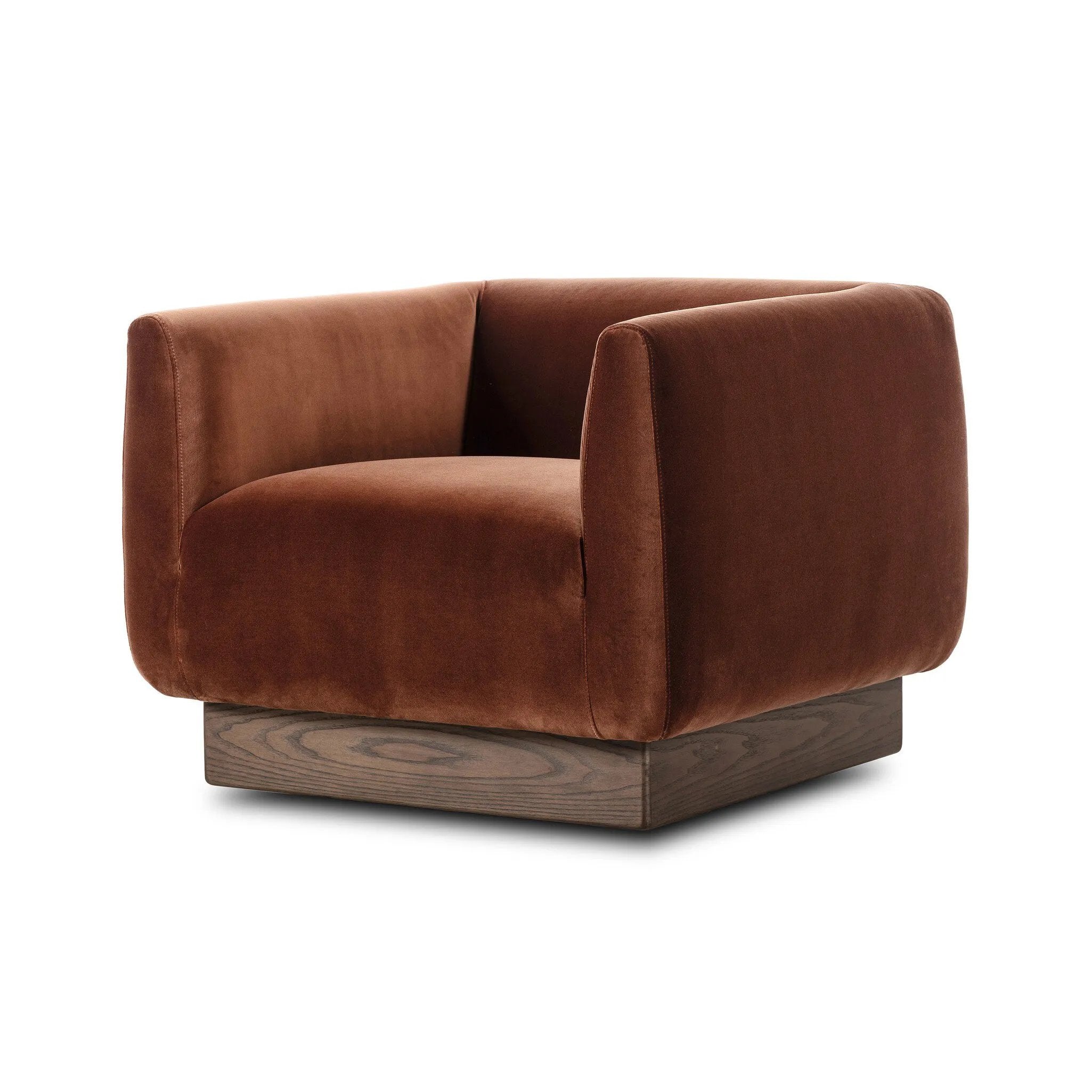 Velvety upholstery in a deep auburn hue covers clean-angled, deeply cushioned seating with a 360-degree swivel base for relaxed lounging and conversation Amethyst Home provides interior design, new home construction design consulting, vintage area rugs, and lighting in the Miami metro area.