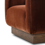 Velvety upholstery in a deep auburn hue covers clean-angled, deeply cushioned seating with a 360-degree swivel base for relaxed lounging and conversation Amethyst Home provides interior design, new home construction design consulting, vintage area rugs, and lighting in the Winter Garden metro area.