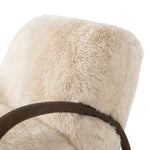 This versatile accent chair is upholstered in a faux Mongolian shearling with a textural high pile. A contrasting, chunky parawood frame hugs the seat and is wire-brushed for a warm, vintage feel Amethyst Home provides interior design, new home construction design consulting, vintage area rugs, and lighting in the Salt Lake City metro area.