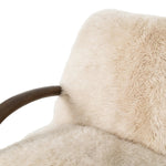 This versatile accent chair is upholstered in a faux Mongolian shearling with a textural high pile. A contrasting, chunky parawood frame hugs the seat and is wire-brushed for a warm, vintage feel Amethyst Home provides interior design, new home construction design consulting, vintage area rugs, and lighting in the San Diego metro area.