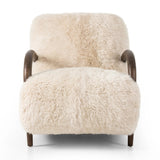 This versatile accent chair is upholstered in a faux Mongolian shearling with a textural high pile. A contrasting, chunky parawood frame hugs the seat and is wire-brushed for a warm, vintage feel Amethyst Home provides interior design, new home construction design consulting, vintage area rugs, and lighting in the Winter Garden metro area.