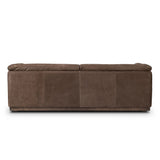 Inspired by 1970s Brutalism, this urban tuxedo sofa balances a rounded solid wood plinth with a curved seat deck and a relaxed, "wrinkled" upholstery design. Feather-blend cushions wrap the frame, finished with dramatic blind tufting for a hand-crafted, textural edge. Amethyst Home provides interior design, new home construction design consulting, vintage area rugs, and lighting in the Boston metro area.