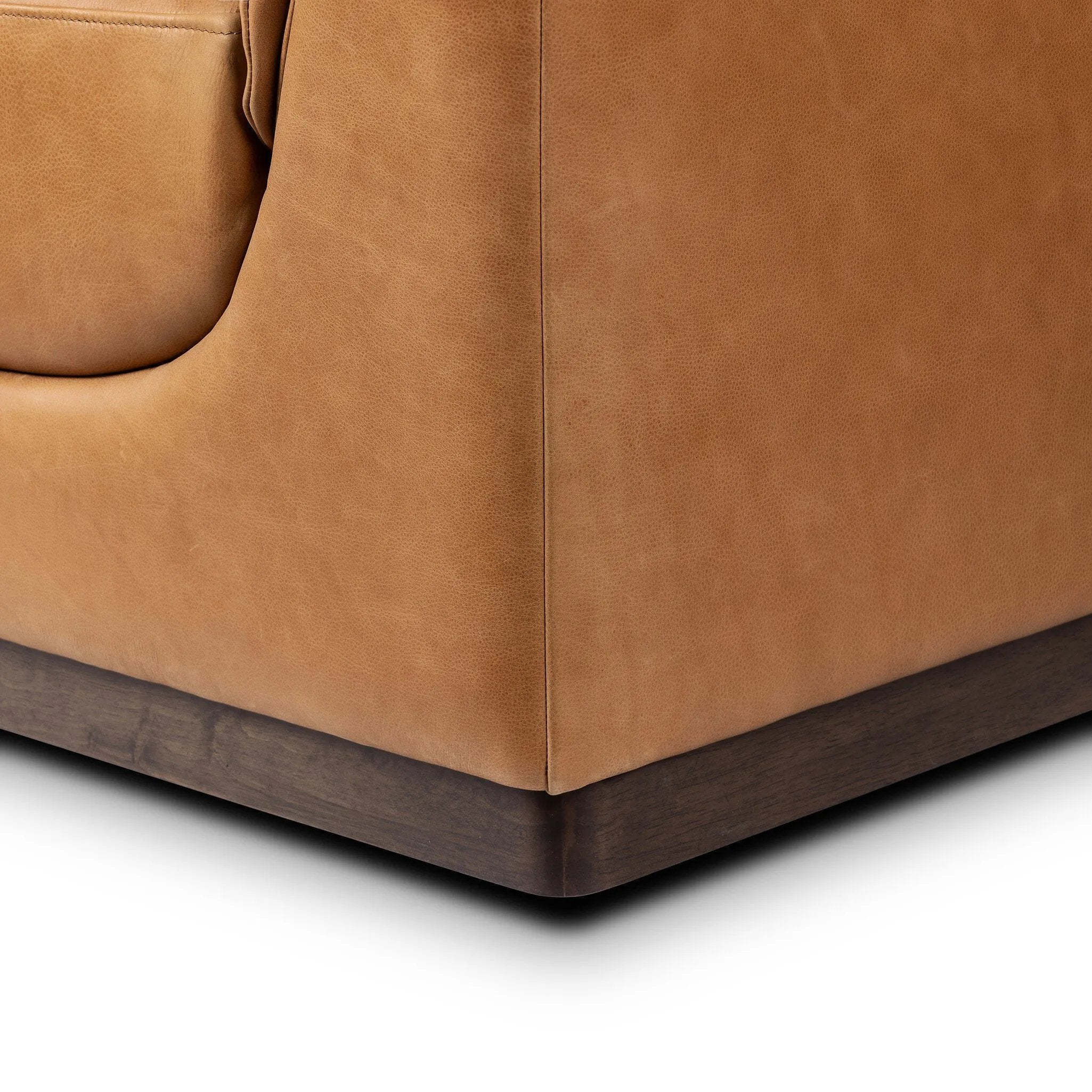 Inspired by 1970s Brutalism, this urban tuxedo sofa balances a rounded solid wood plinth with a curved seat deck and a relaxed, "wrinkled" upholstery design. Feather-blend cushions wrap the frame, finished with dramatic blind tufting for a hand-crafted, textural edge. Amethyst Home provides interior design, new home construction design consulting, vintage area rugs, and lighting in the Newport Beach metro area.