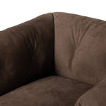 Inspired by 1970s brutalism, this urban swivel chair balances a rounded solid wood plinth with a curved seat deck and a relaxed, "wrinkled" upholstery design. Feather-blend cushions wrap the frame, finished with dramatic blind tufting for a hand-crafted, textural edge. Amethyst Home provides interior design, new home construction design consulting, vintage area rugs, and lighting in the Los Angeles metro area.