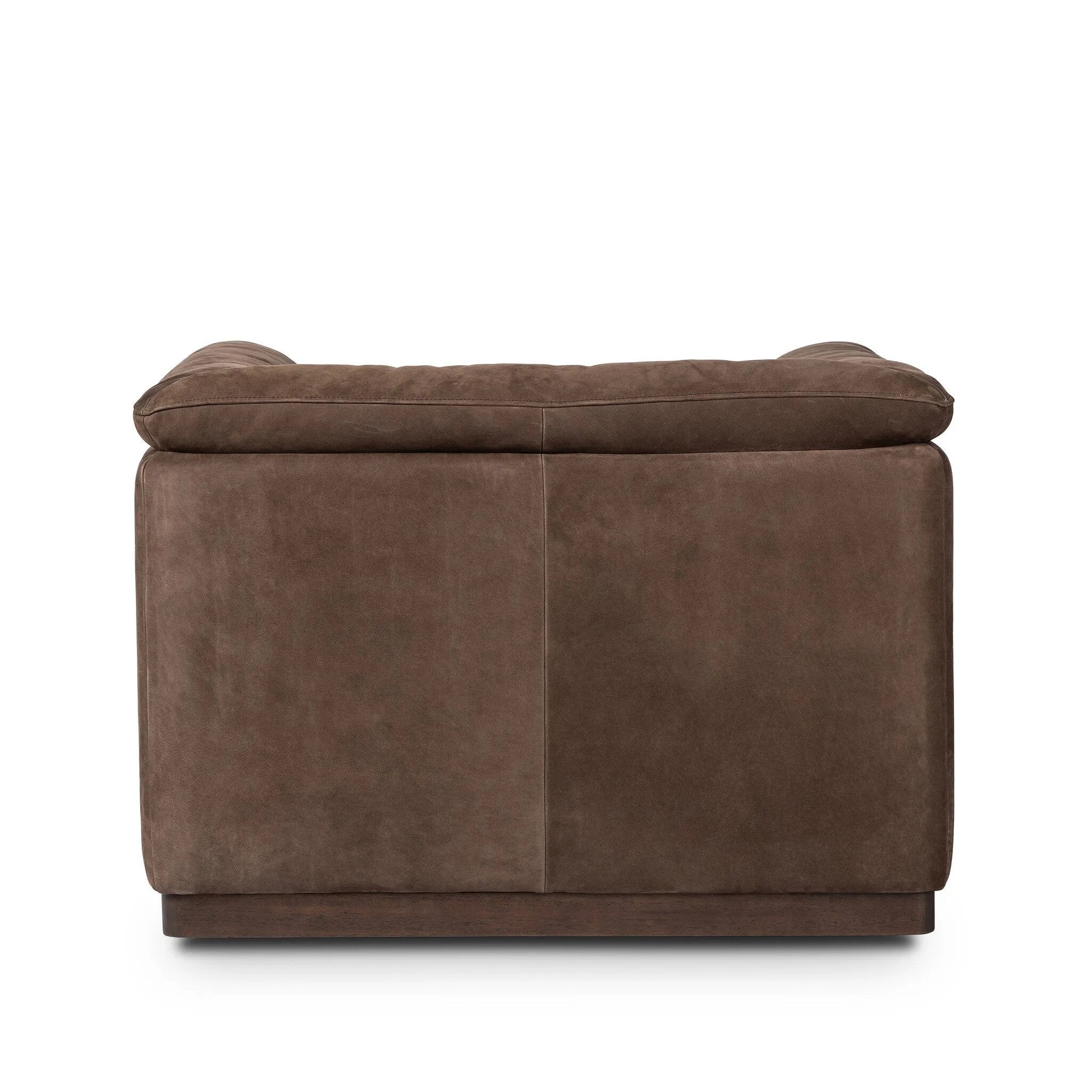 Inspired by 1970s brutalism, this urban swivel chair balances a rounded solid wood plinth with a curved seat deck and a relaxed, "wrinkled" upholstery design. Feather-blend cushions wrap the frame, finished with dramatic blind tufting for a hand-crafted, textural edge. Amethyst Home provides interior design, new home construction design consulting, vintage area rugs, and lighting in the Miami metro area.
