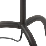 A curved cast iron tripod base pairs with an elongated boucle shade for a sculpted, minimalist look that works into any room with ease Amethyst Home provides interior design, new home construction design consulting, vintage area rugs, and lighting in the Kansas City metro area.