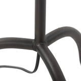 A curved cast iron tripod base pairs with an elongated boucle shade for a sculpted, minimalist look that works into any room with ease Amethyst Home provides interior design, new home construction design consulting, vintage area rugs, and lighting in the Kansas City metro area.