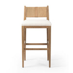 Unique materials make this bar stool a standout. A low, perfectly pitched backrest is made from wrapped paper cord and aged oak, for a natural, textured look. Simple squared seating is upholstered in high-performance fabric, perfect for entertaining. Amethyst Home provides interior design, new home construction design consulting, vintage area rugs, and lighting in the Newport Beach metro area.