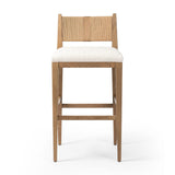 Unique materials make this bar stool a standout. A low, perfectly pitched backrest is made from wrapped paper cord and aged oak, for a natural, textured look. Simple squared seating is upholstered in high-performance fabric, perfect for entertaining. Amethyst Home provides interior design, new home construction design consulting, vintage area rugs, and lighting in the Newport Beach metro area.