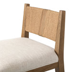 Unique materials make this bar stool a standout. A low, perfectly pitched backrest is made from wrapped paper cord and aged oak, for a natural, textured look. Simple squared seating is upholstered in high-performance fabric, perfect for entertaining. Amethyst Home provides interior design, new home construction design consulting, vintage area rugs, and lighting in the Portland metro area.