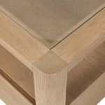 Bring bonus storage and a light look to the living space. Made from sandy oak and clear tempered glass with a single drawer, shelving beneath the glass doubles as a shadowbox or an extra display surface.As lovers of clean materials at Amethyst, we love the designer inspired Shiloh End Table - Tempered Glass. Amethyst Home provides interior design, new home construction design consulting, vintage area rugs, and lighting in the San Diego metro area.